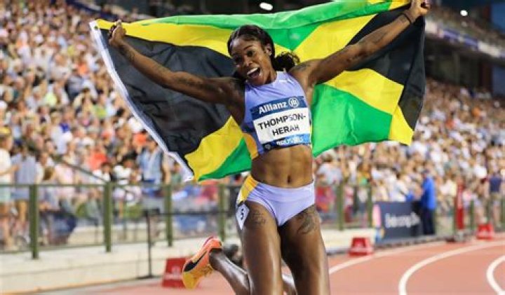 Elaine Thompson-Herah in Two-Piece Workout Gear Says "Happy Monday"