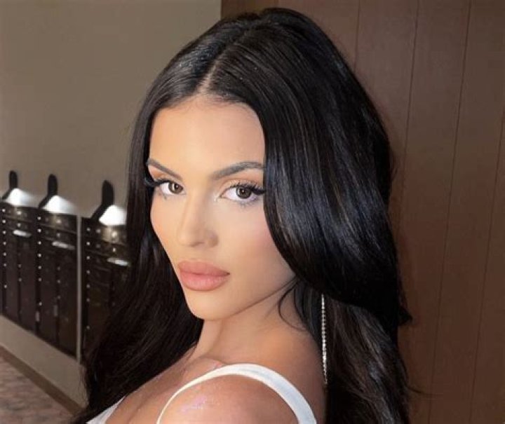 Holly Scarfone in Bathing Suit Says "Life is Peachy" — Celebwell