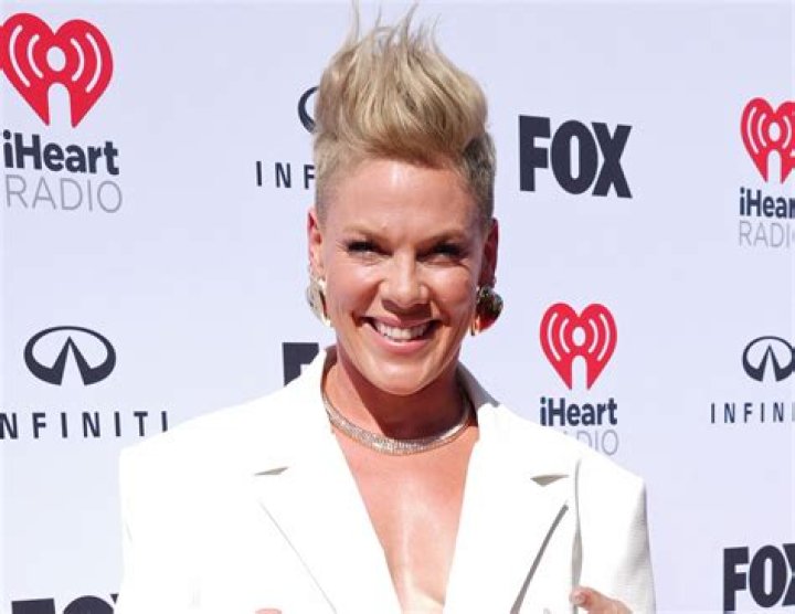 Pink in Bathing Suit Says "See Ya Soon" — Celebwell
